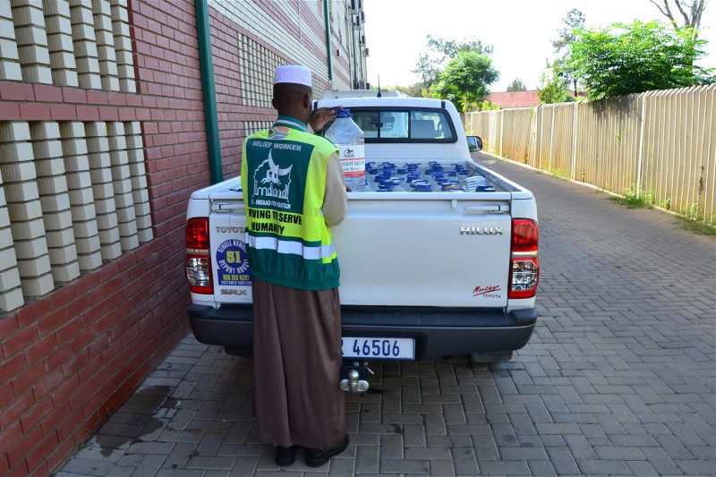 Al-Imdaad Foundation’s  Hassan Shazi help load a vehicle that will be used during the assessment and distribution
